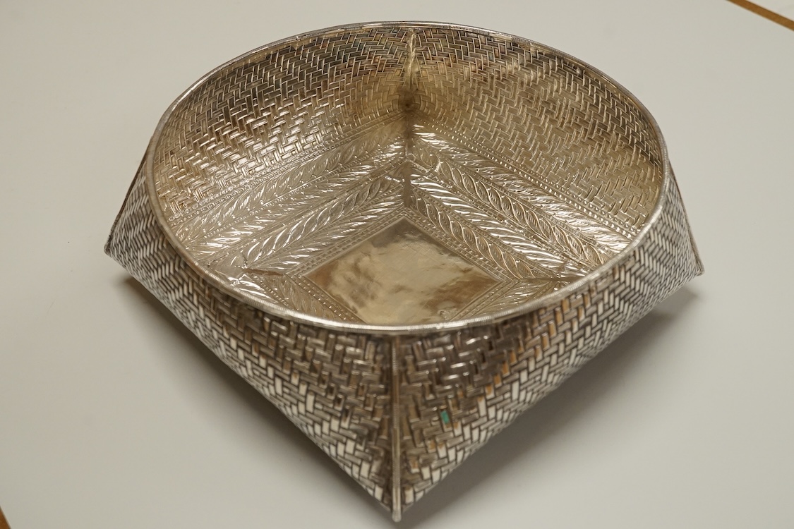 An Indian or Middle Eastern white metal fruit bowl, with 'basket weave' decoration, indistinct marks, diameter 21.8cm, 10.2oz.